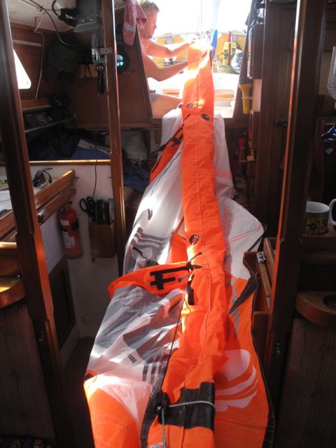 Kite repairs aboard Confed